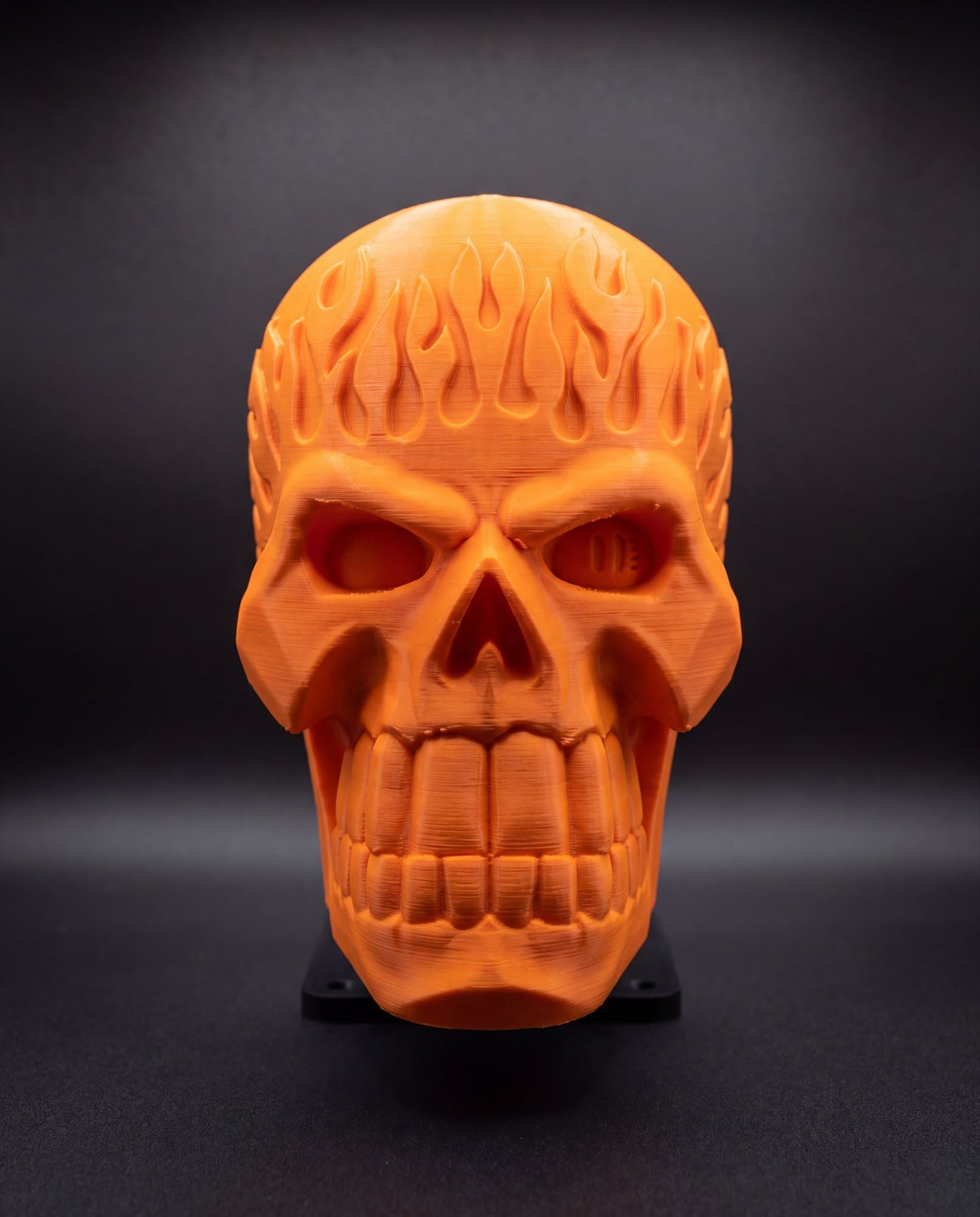 Blaze Orange — Flame skull mount, front elevation